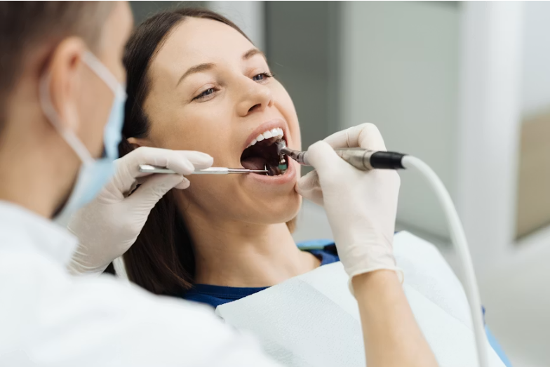 patient receiving dental crown treatment during a dental examination