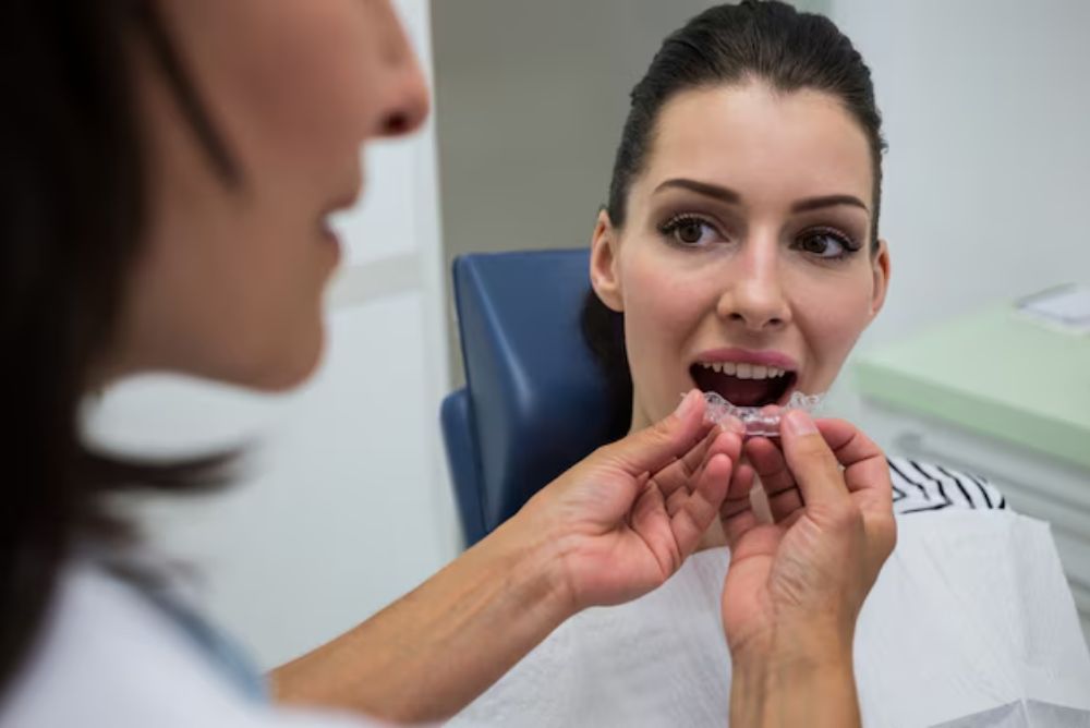 clear Invisalign aligners designed to straighten teeth and improve smile alignment